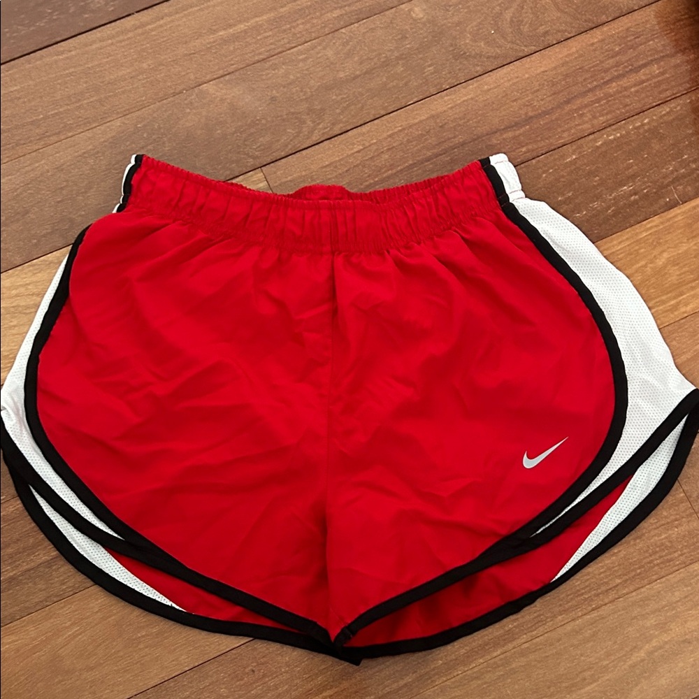 Red Nike Athletic Shorts with White and Black Trim